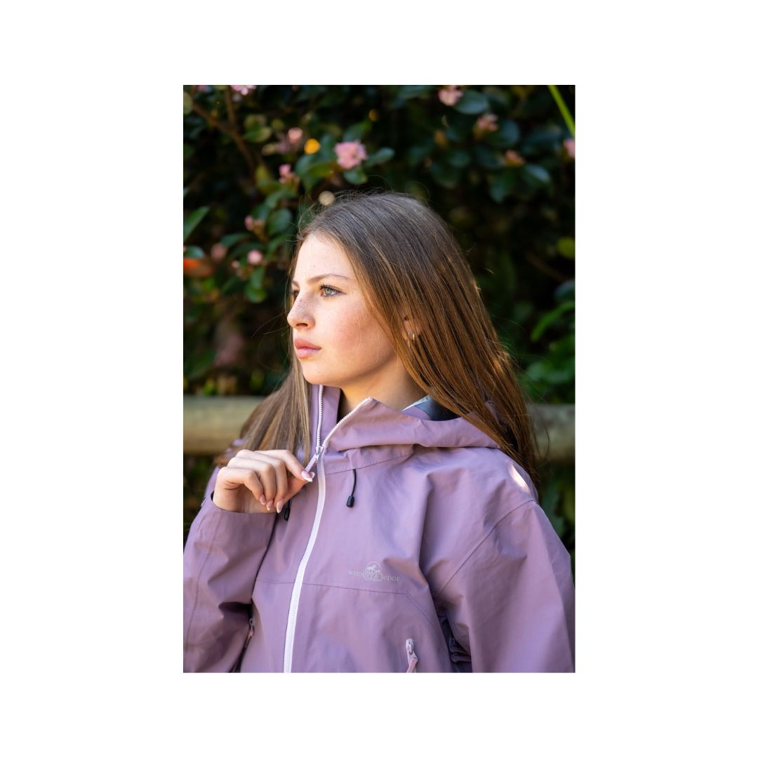 Whinny & Woof purple lightweight raincoat for equestrians, ideal for horse shows, dog walking and everyday rain protection.